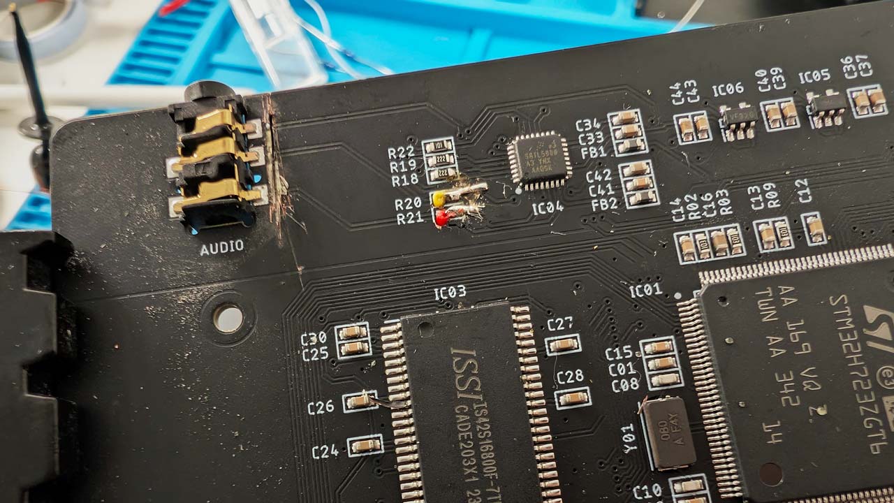 [Cut traces next to the audio socket]